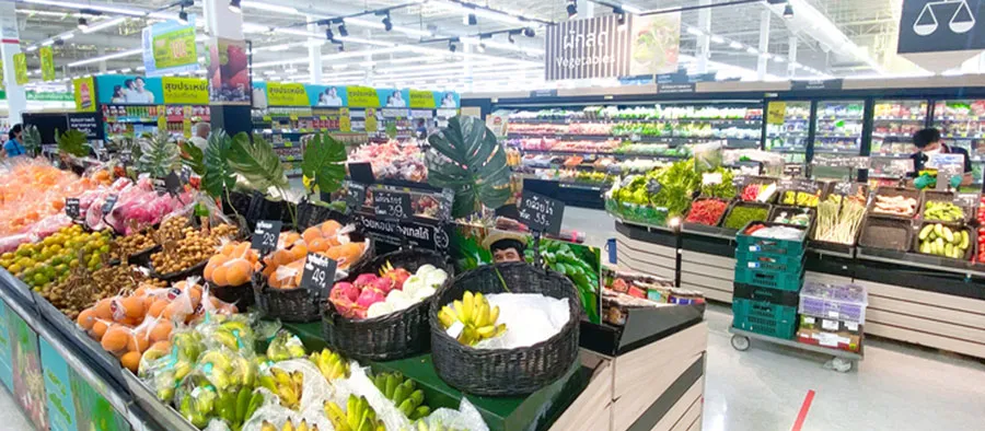 view of produce in large open grocery store